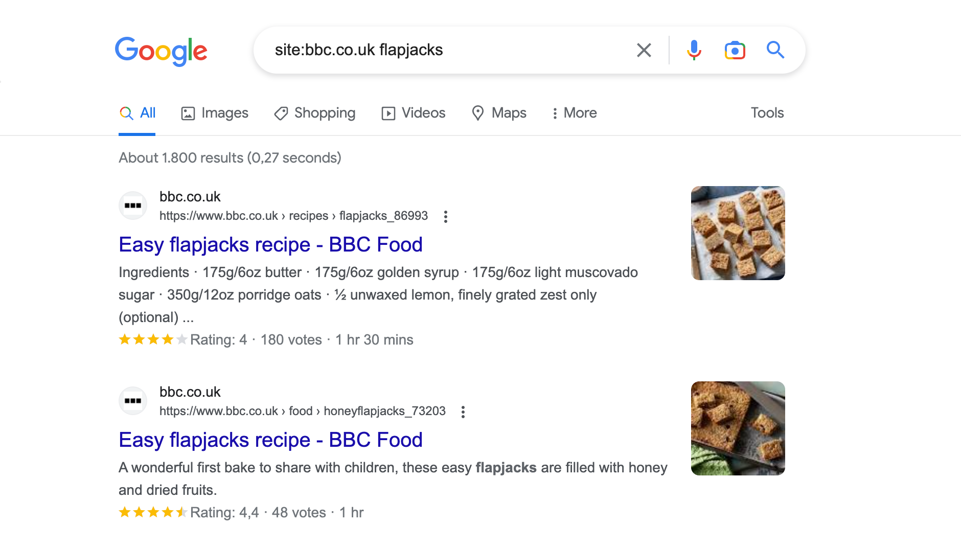 A Google site: query for the keyword flapjacks on bbc.co.uk. The first two results are URLs to specific recipes. About 1,800 results are displayed.